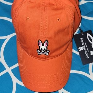 Adjustable strap cap